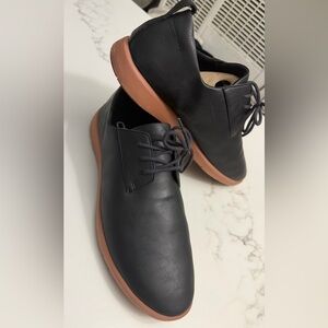 Stylish Black Leather Oxfords with Tan Soles